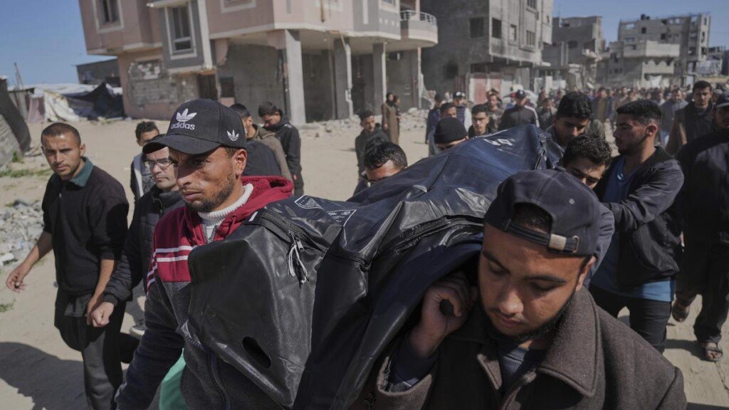 Palestinians carry the body of Ismail Barhoum, a member of Hamas’ political bureau who was killed is an Israeli army strike of Nasser Hospital in Khan Younis, Gaza Strip, Monday, March 24, 2025 | Photo Credit: AP